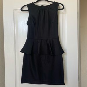Sleeveless peplum mini dress